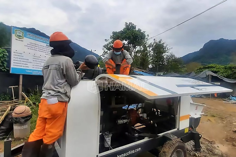 Concrete pump operator at site